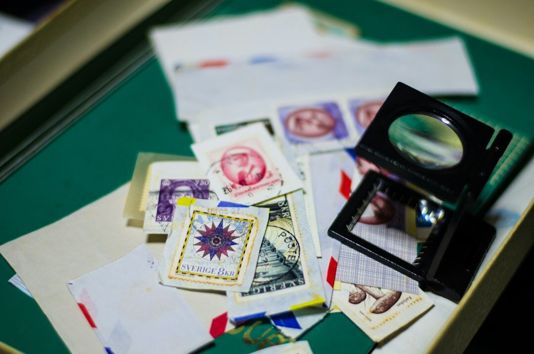 stamp collector examining stamps